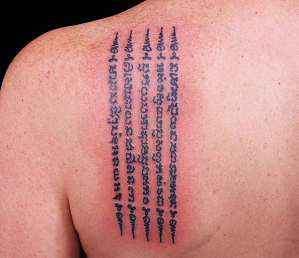 I want chest tattoo for men . Continuous Line Tattoo style .Tattoo may  include some symbols from