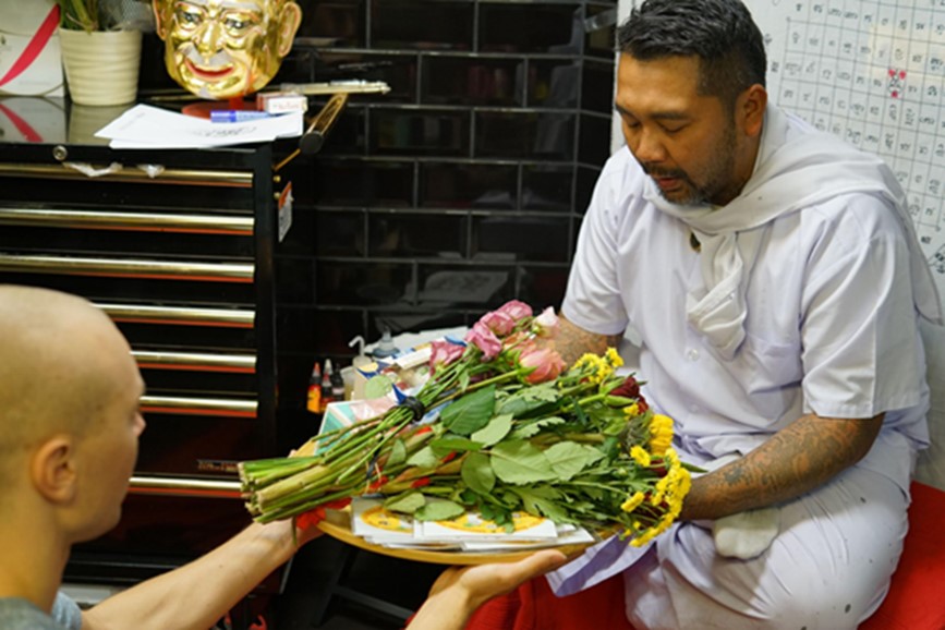 Offering to Sak Yant Thai Tattoo Master