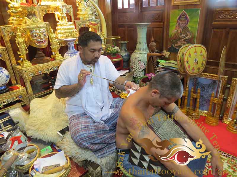 Ajarn Ohr doing Sak Yant Thai Tattoo