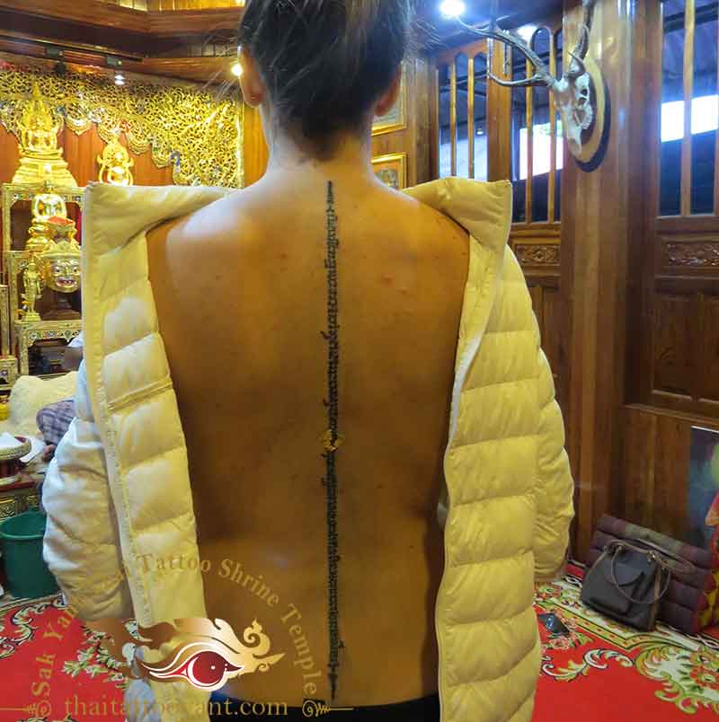 Single Line Down Spine Sak Yant Thai Tattoo